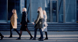 group of people walking in city